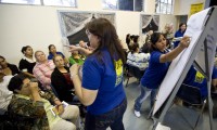 Woman leads community discussion -  Tim Wagner for PartnershipPH.org